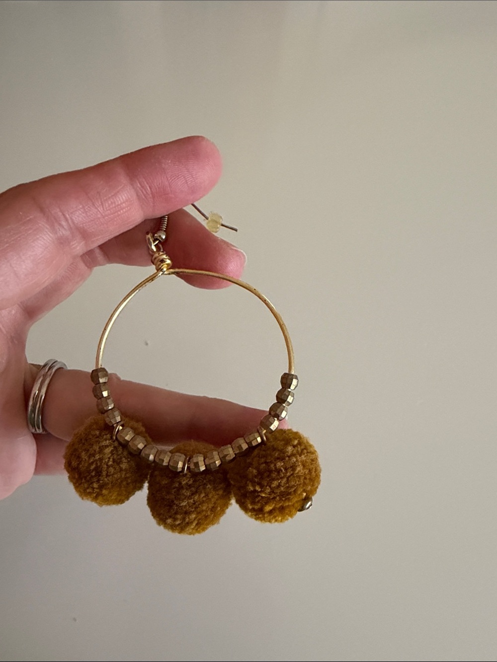 Noonday Collection Gold Hoop Earrings with Mustard Pom-Poms - Picture 3 of 3